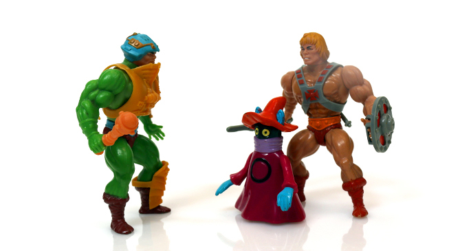 Man-At-Arms talking with He-Man and Orko